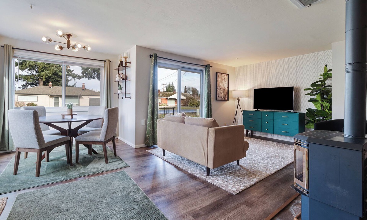 Lacey House | Fully fenced and gated two bedroom home that easily accommodates four guests. Featuring a large covered private patio for year round enjoyment and relaxation. Fully equipped kitchen and laundry with full size washer/dryer. Lots on parking on site.