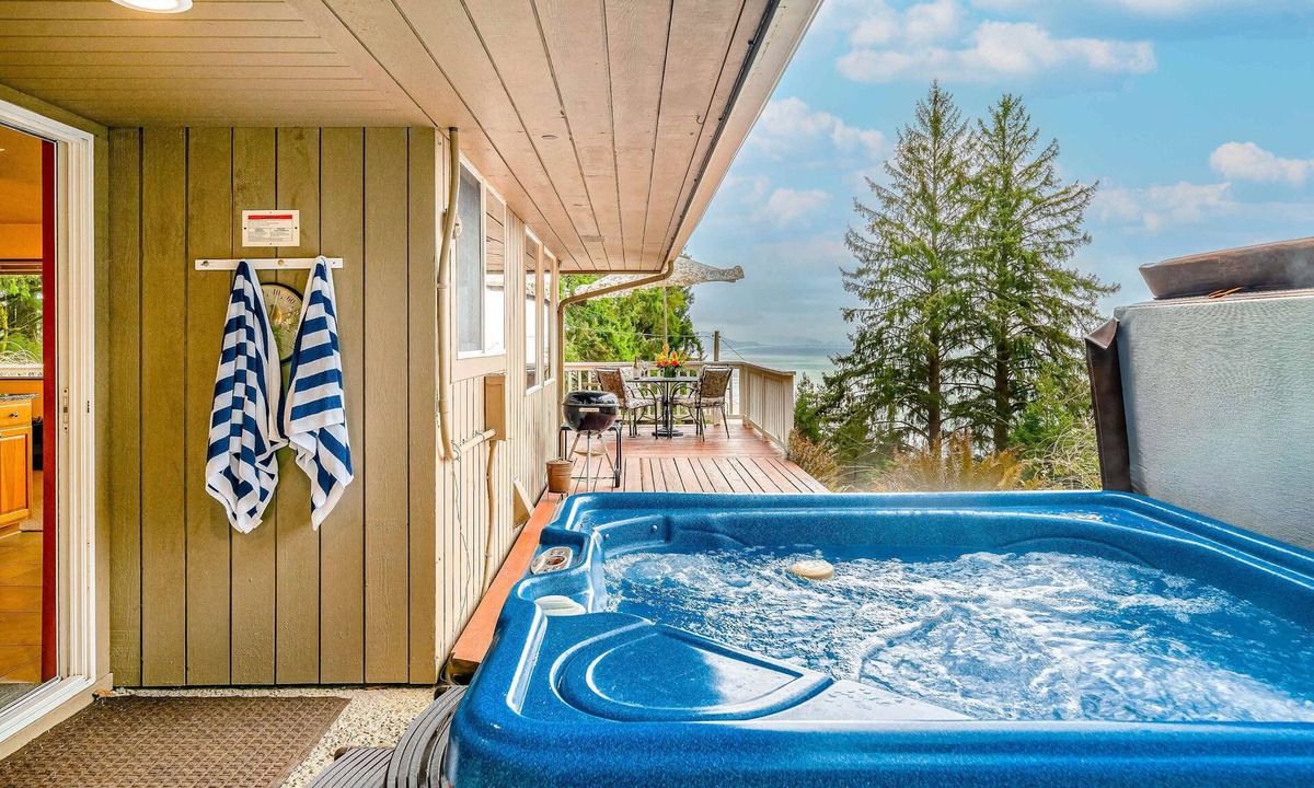Neahkahnie Beach House | Inviting home with spectacular view, hot tub, balcony, fireplace, & W&D