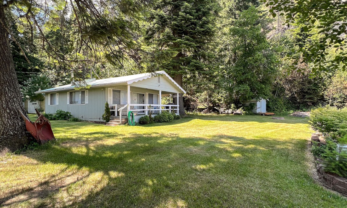Rathdrum House | Lakefront home with private dock, large yard, wood stove, firepit, grill, W/D