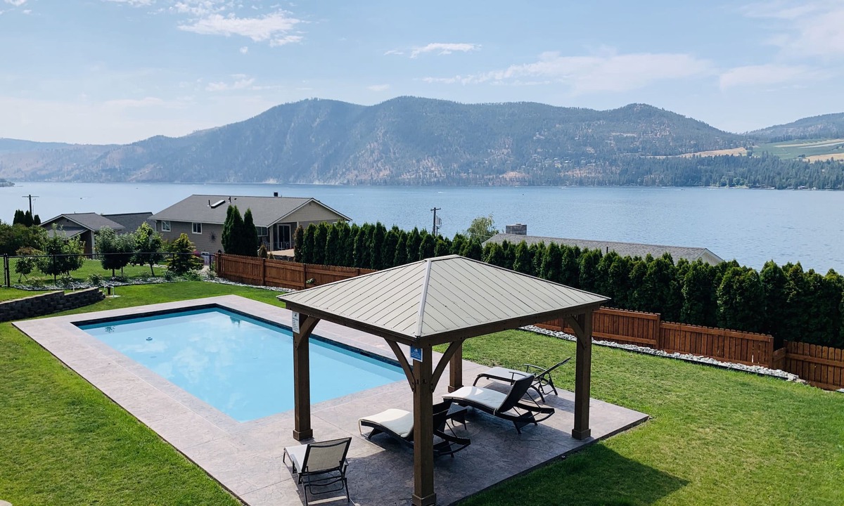 Manson House | Large Home with Sweeping Lake Views, Heated Private Pool and Hot Tub