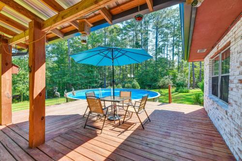 Newnan House | Pool & Deck: Pond-View Getaway in Newnan!
