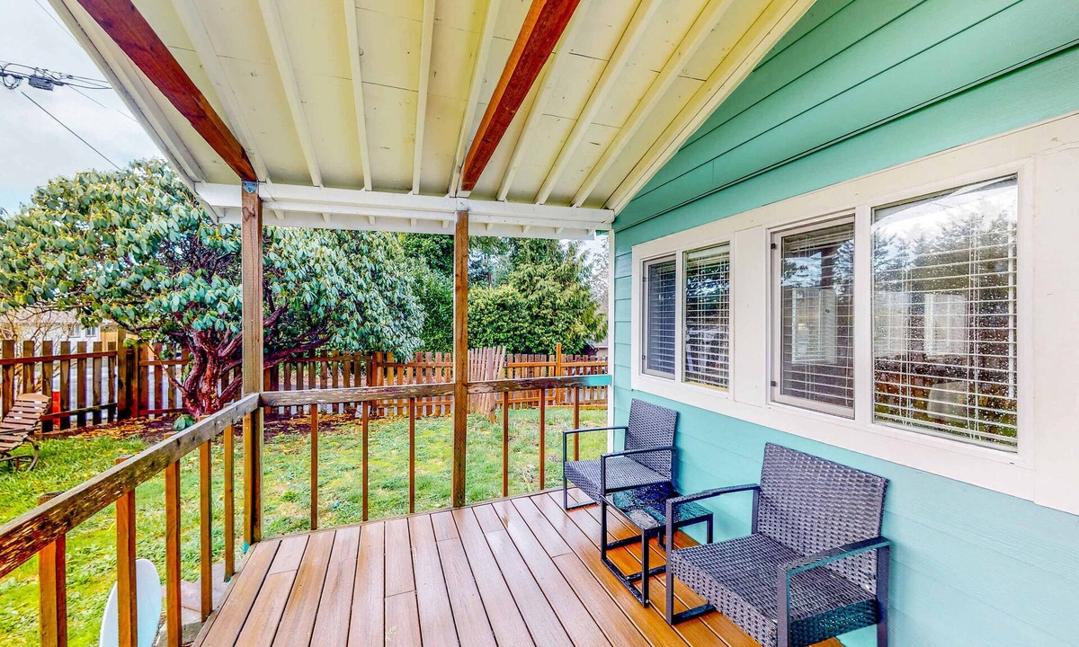 Netarts House | Renovated dog friendly cottage with a covered porch deck yard and washer dryer