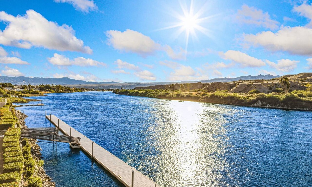 Bullhead City Condo | Riverfront Marina Retreat with Pool!