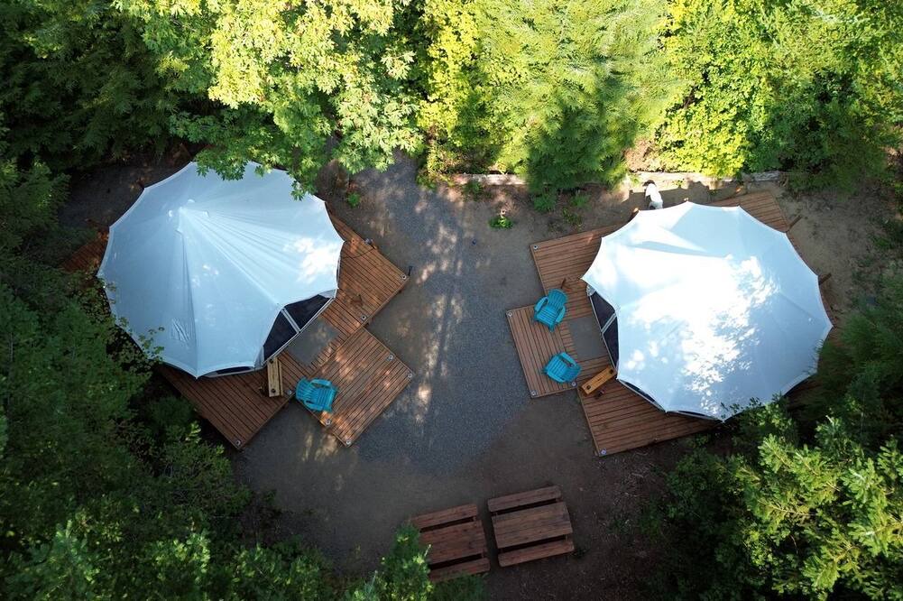 Carson RV Rental | Spacious Dual Bell Tent Glamping Retreat with Forest Deck near Carson, Washington