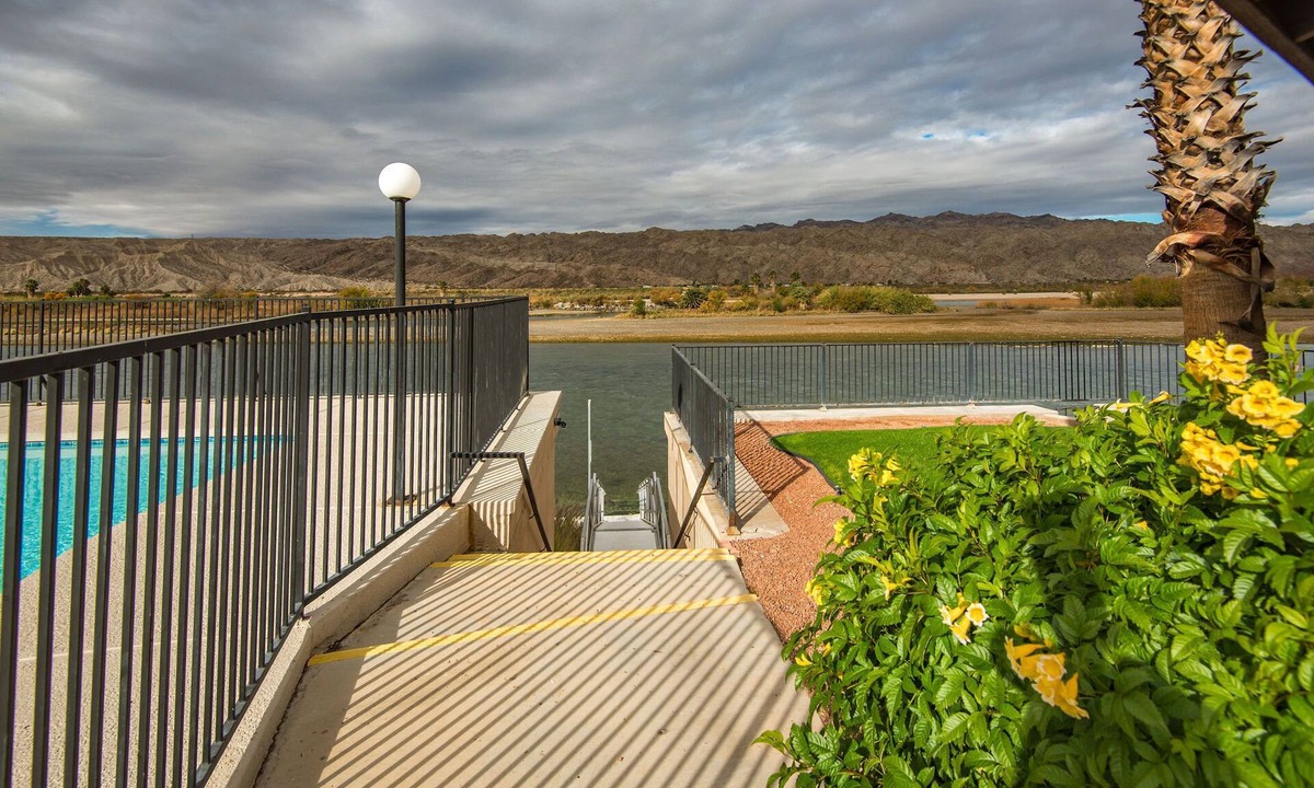 Holiday Shores Condo | Steps from the River! Cozy 2 bed/2 bath condo. Min 30 day rental.