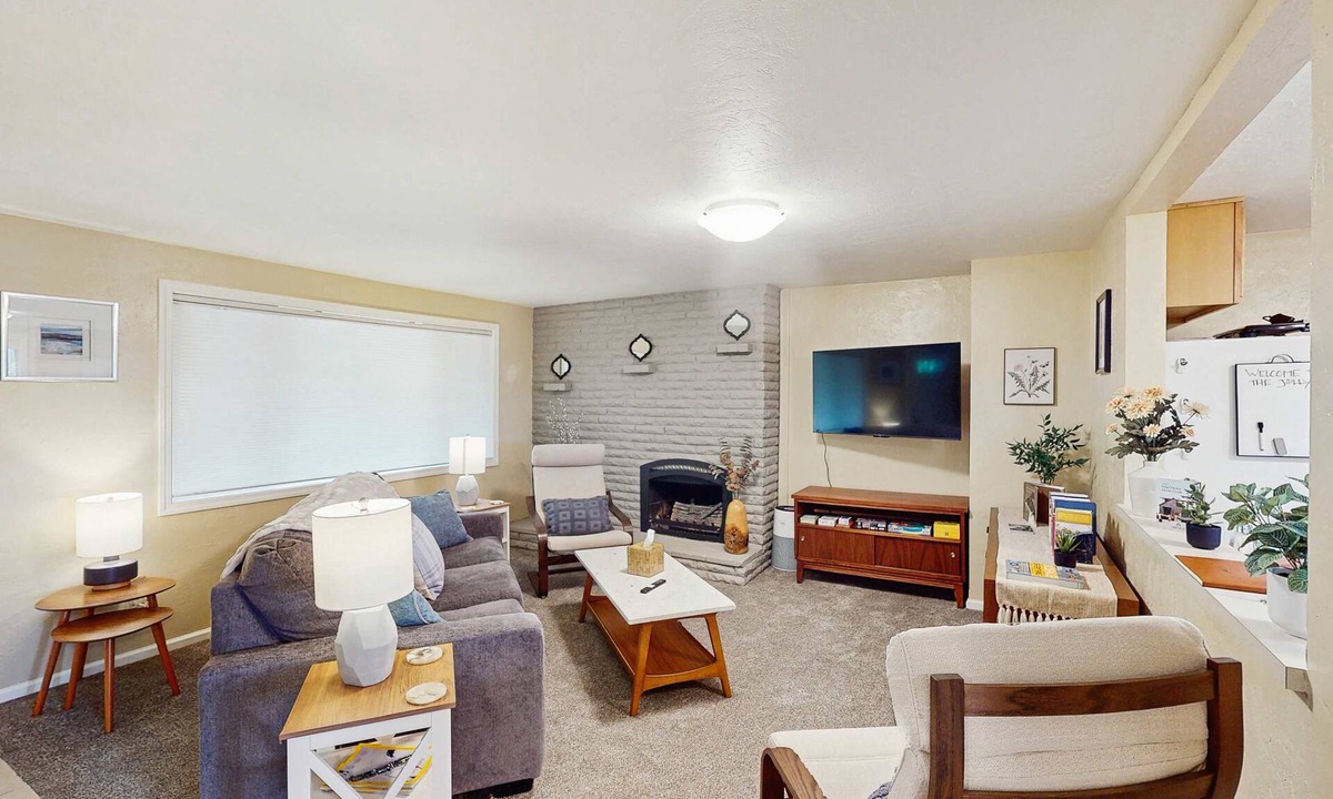 Friendly Condo | Upper level of duplex with a large deck & mountain view - dog friendly for 1 dog