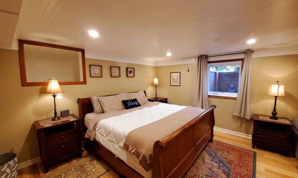 Concordia House | Well appointed basement guest suite with private entrance & backyard oasis.