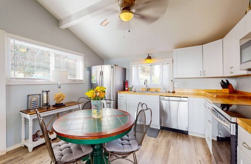 Port Orford House | Adorable, nautical-themed home with a private hot tub & ocean views