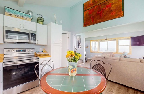 Port Orford House | Adorable, nautical-themed home with a private hot tub & ocean views