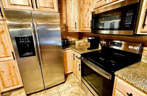 Duck Creek Village Cabin | Backwoods Bonanza BIG Cabin and Hot Tub!