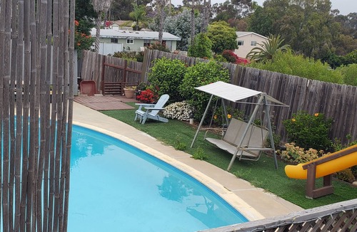 Townsite Apartment | Beach Surfer Bungalow 16 blocks from beach, pool and private yard and patio