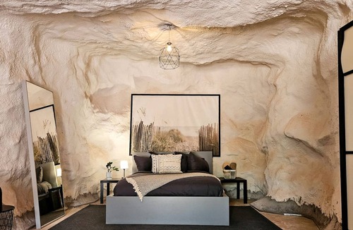Moab Cabin | Beautiful Cave by the Colorado River with Stunning Canyon Views for a Unique Adventure in Moab, Utah