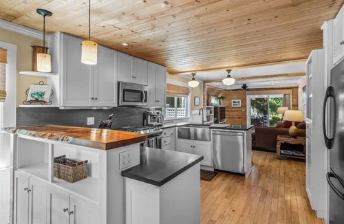 Old Bend House | Bluebird Day - River West: A serene riverfront retreat in Bend, OR, with 3 beds and stunning views.