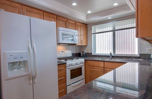 West Newport Condo | Bright and Cheery and Green.a beautiful lower unit with lots of personality!