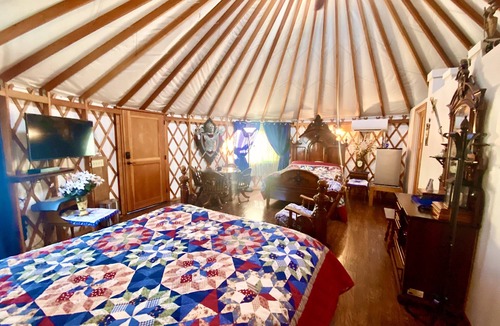 Veneta Cabin | Camelot is a fully furnished yurt themed after the mythical Arthurian legend.