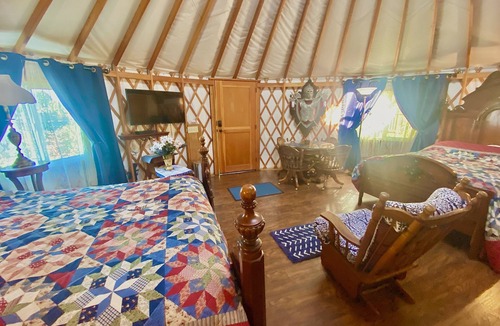 Veneta Cabin | Camelot is a fully furnished yurt themed after the mythical Arthurian legend.