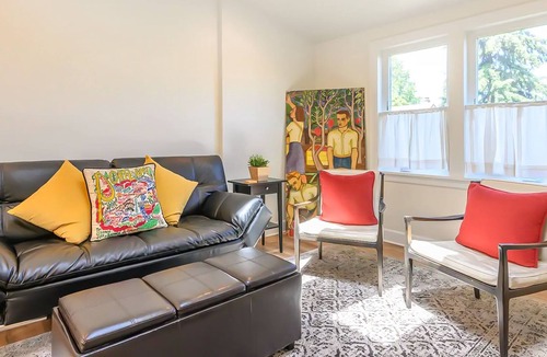 Uptown Apartment | Central city apartment with mountain-views, fireplace, & private washer/dryer