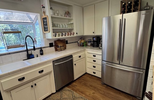 West Village House | Charming West Village Cabin, 5 Minutes to the Lake
