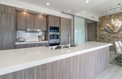 East Village Condo | Cityscape Elegance with Water Views