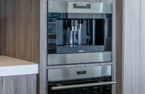 East Village Condo | Cityscape Elegance with Water Views