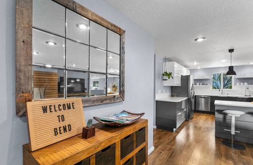 Larkspur House | Clean Bend home with private hot tub, yard, and dedicated office