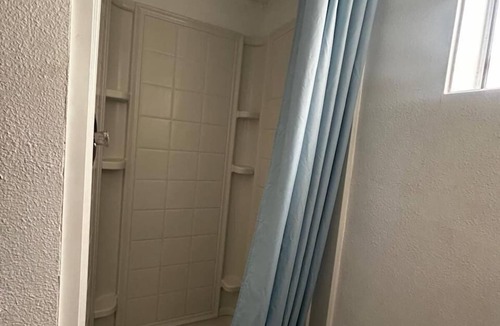 Longview Hotel | Convenient Room Near St. John Medical Center + Free Private Parking