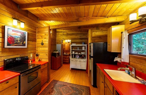 Brightwood Cabin | Cozy riverfront cabin with wood-burning fireplace, lovely deck, and washer/dryer
