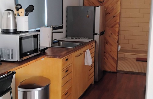 Joshua Tree RV Rental | Cozy, spacious off grid cabin. Perfect for 4 adults, or small family.