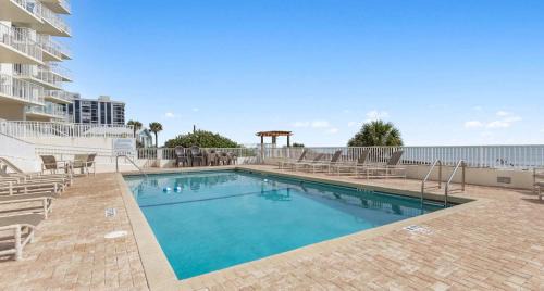 Seawinds Condo Apartment | Direct oceanfront 2/2 corner condo with large balcony, heated pool, and garage parking