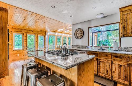 Mount Hood Village House | Dog-friendly creekside home with entertainment barn private hot tub & firepit