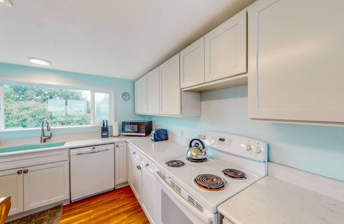 Nelscott House | Dog friendly home with deck and ocean views close to the beach