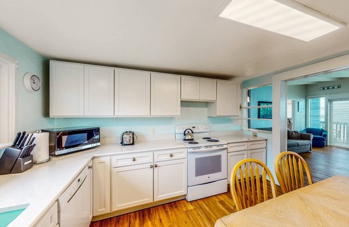 Nelscott House | Dog friendly home with deck and ocean views close to the beach