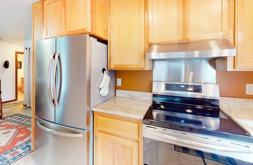 Port Orford House | Dog-friendly lakefront home with lake views, deck, partial AC, & W/D
