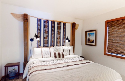 Port Orford House | Dog-friendly lakefront home with lake views, deck, partial AC, & W/D