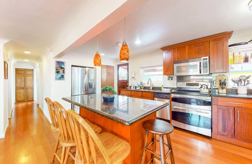 Maplewood House | Dog-friendly riverfront home with patio, golf nearby, enclosed yard, & W/D
