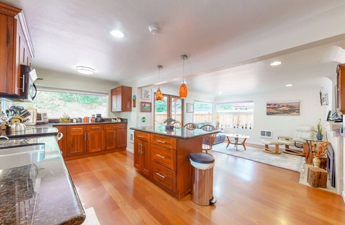 Maplewood House | Dog-friendly riverfront home with patio, golf nearby, enclosed yard, & W/D