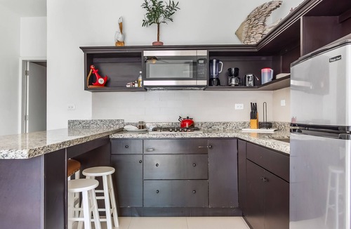 La Paloma Apartment | Dog-friendly suite with beach views, outdoor pool, patio, kitchenette, & AC