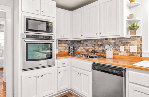 Buford Cottage | Downtown Buford: Walk to Eats, Shops & Events