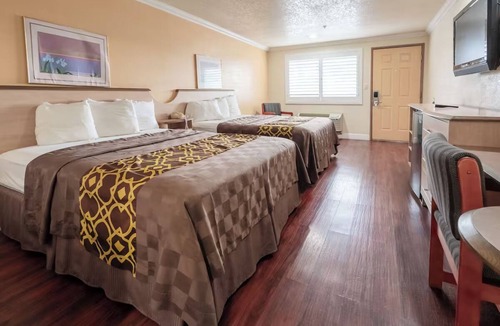 Corcoran Hotel | Essential Comforts in a Clean Room Near Transit & Local Dining Hotspots