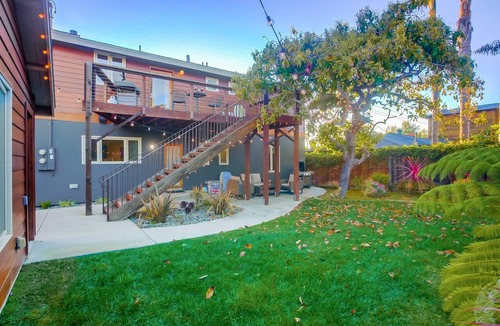 Beach Barber Tract Condo | Exclusive Backyard * Ground Level * Blocks to Beach