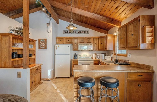 Munds Park House | HIDDEN VISTA: Distance views from private oversized deck nestled in cool pines.