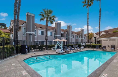 Downtown Village House | Home Away from Home! TWO 2BR Suites w/ Kitchens! Pool, Jacuzzi, Private Parking!