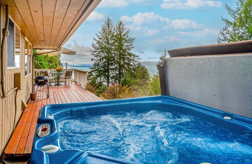 Neahkahnie Beach House | Inviting home with spectacular view, hot tub, balcony, fireplace, & W&D
