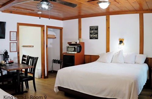Florence Hotel | King Quad Rooms: Double King Beds & Rustic Woods Comfort for 5!