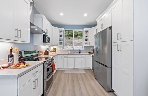 West Hills House | Lakefront-Hot Tub, 2 Kitchens, Kayaks, Game Room