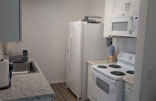 Lakeside House | Lakeside Retreat with Big Porch, Extra Parking, and Prime Downtown Location