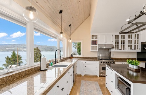 Ardenvoir House | Luxe lake-view home with a private, indoor pool, patio, washer/dryer, & AC