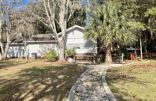 Townsend House | Marsh Front Home with Deep Water Dock on White Chimney River-Shellman Bluff.