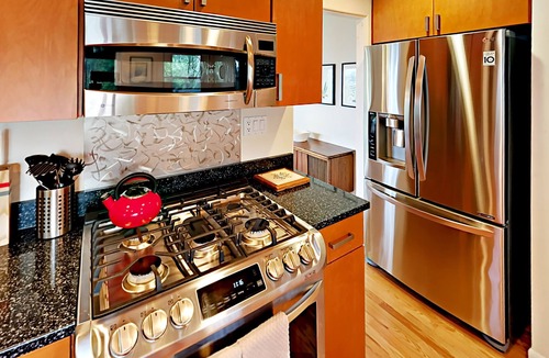 Fremont House | Mid-century modern home with canal & mountain views, & great location