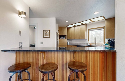 Overlook Park House | Multi-level home with private hot tub, decks, and SHARC passes provided